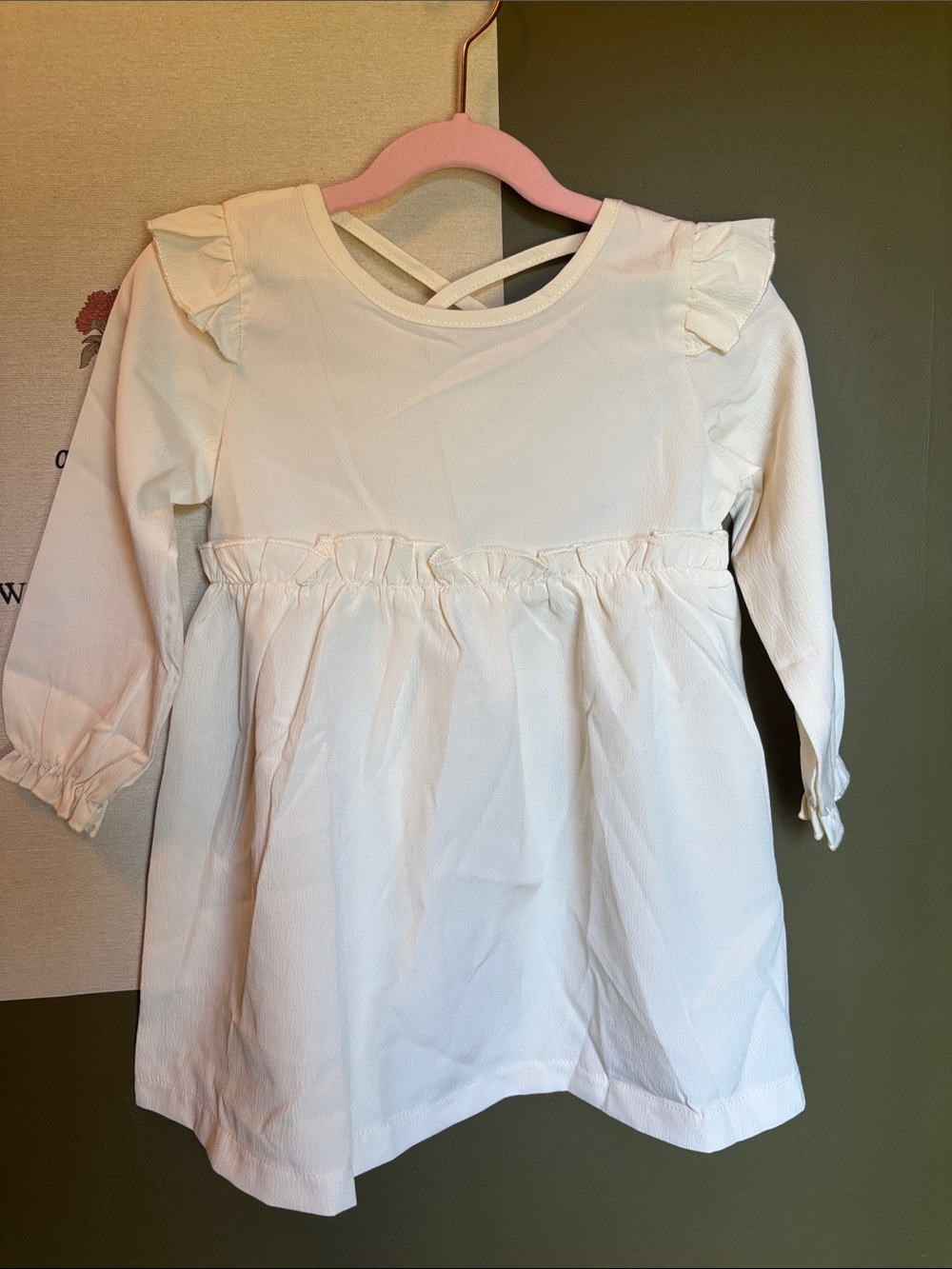 White Long Sleeve Ruffle Peplum Top with Cross-Back NWOT